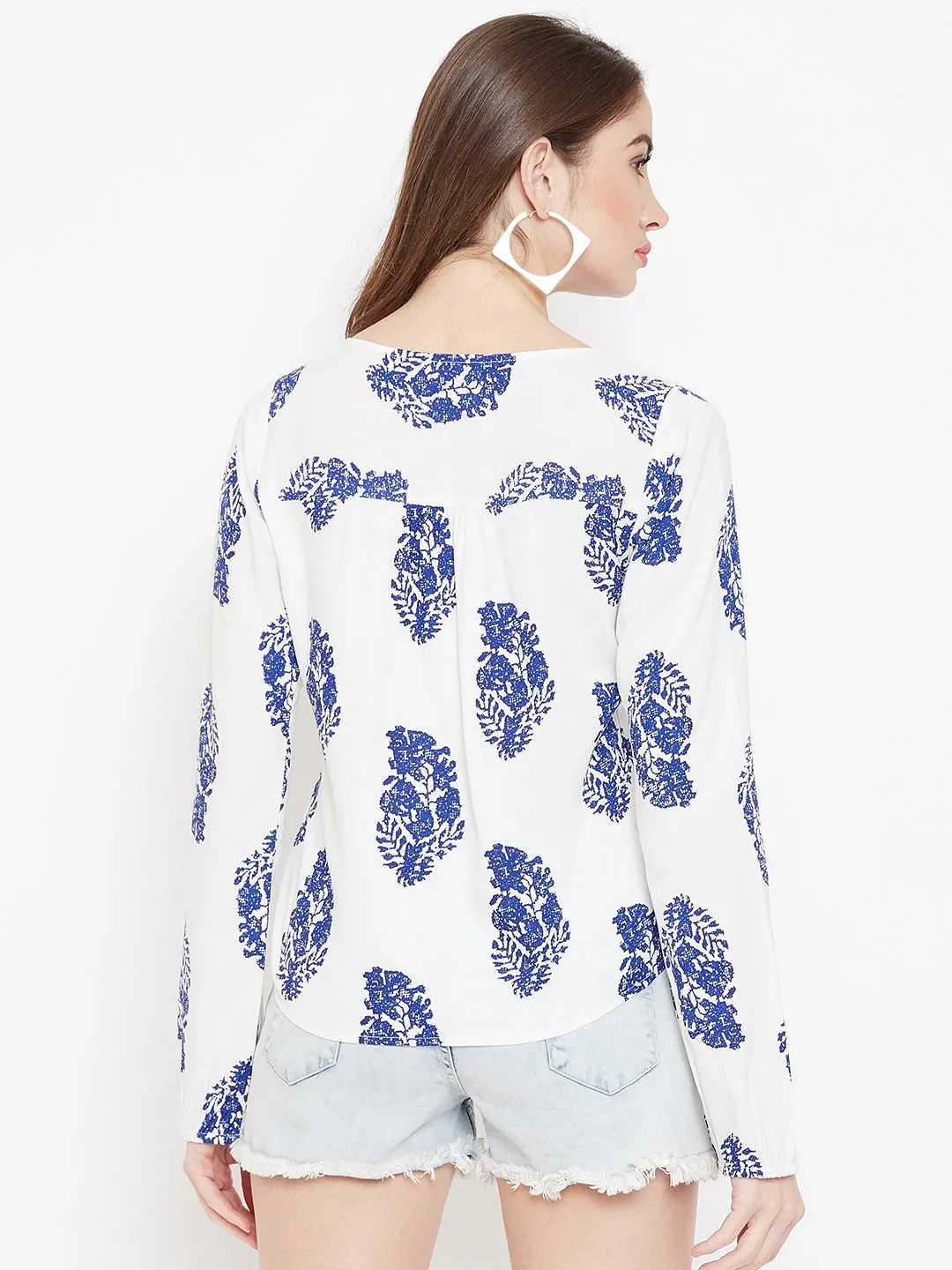 Berrylush Women White & Blue Floral Printed V-Neck Medium Transparent Blouson Top