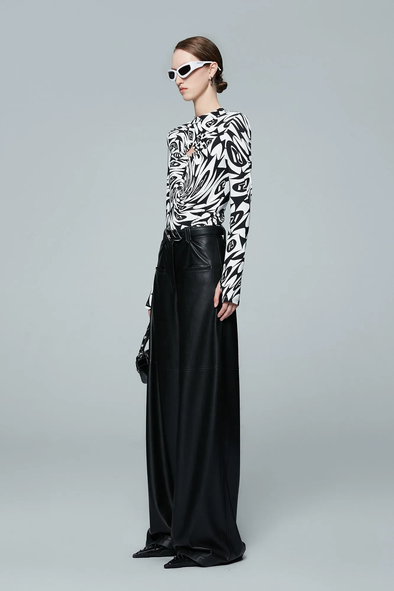 Monogram contoured printed hollowed out polka dot top