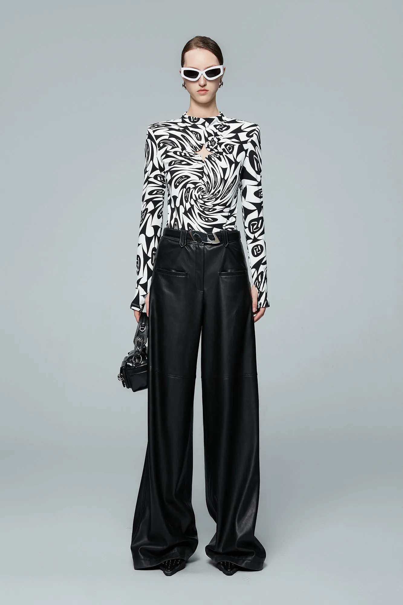 Monogram contoured printed hollowed out polka dot top